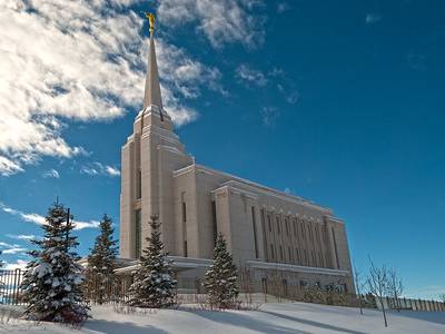 The Rexburg Temple on a snowy day with blue sky